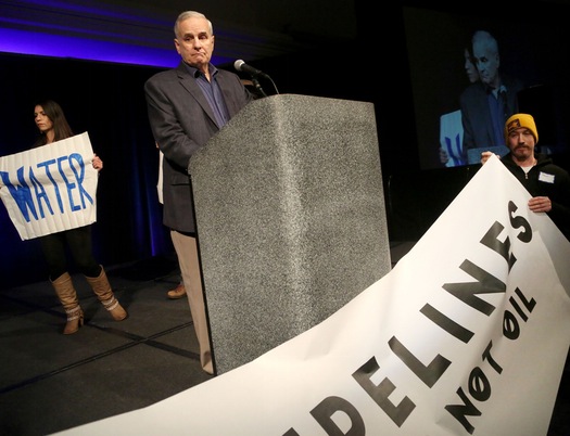 Gov. Dayton rallies support for clean water at summit after facing a protest