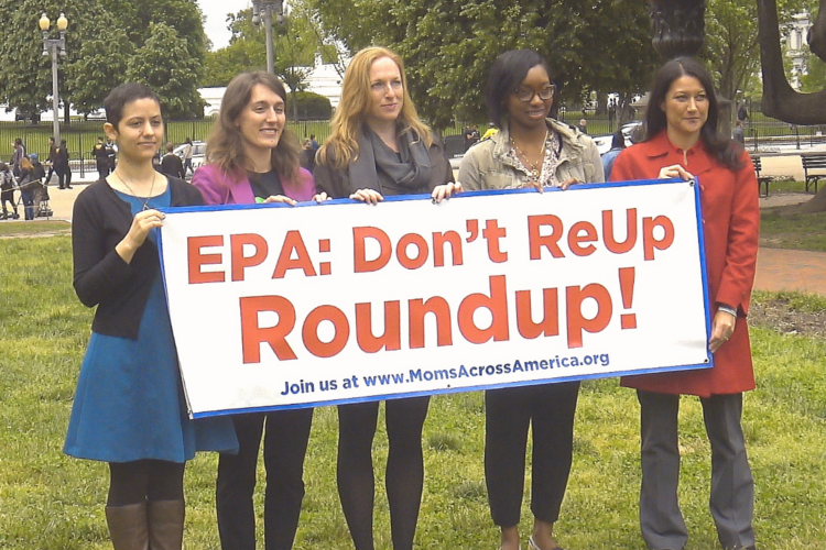 activists holding EPA: Don't Re-Up Roundup! banner