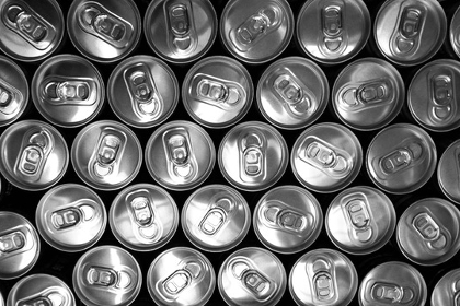 Overhead view of many aluminum soda pop cans