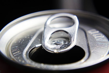 Mouth at the top of a soda pop can