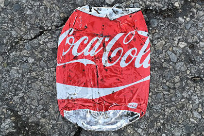 Crushed Coca Cola soda can