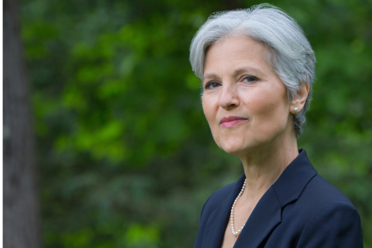 head shot of Jill Stein in front of trees
