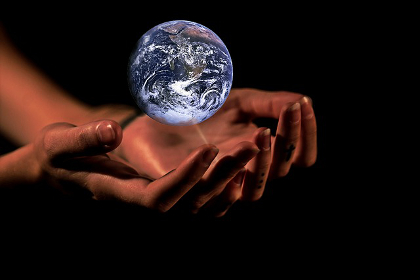 Hands holding the planet Earth