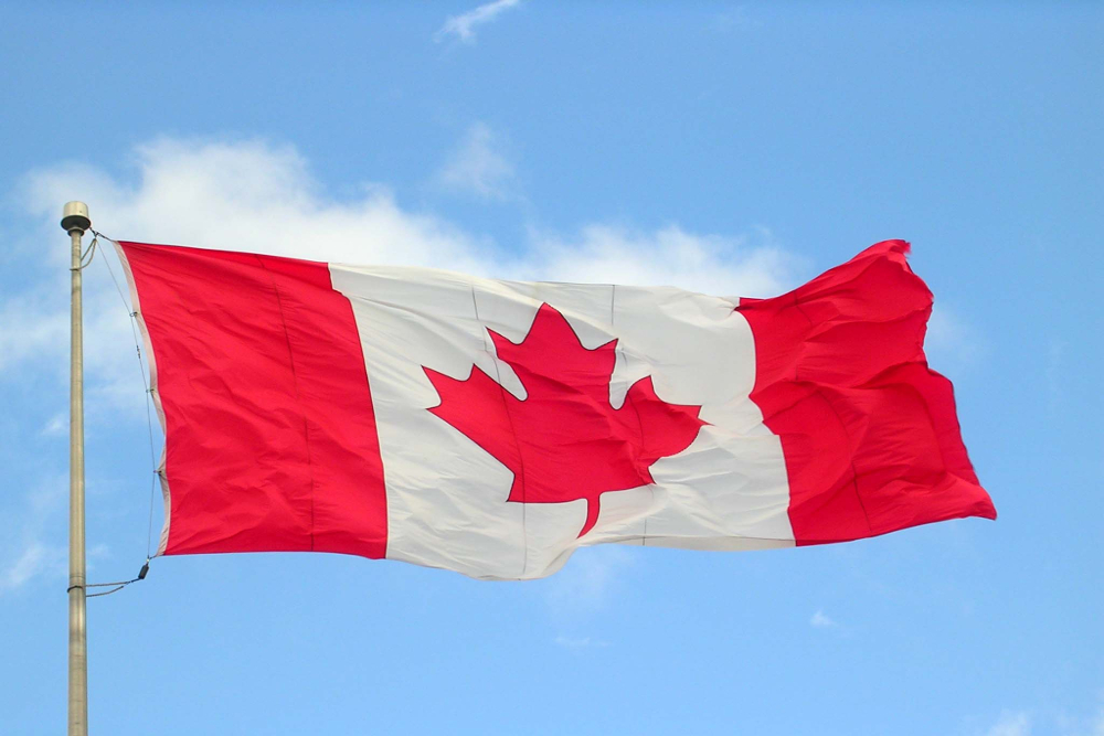 Canada flag waves in the wind