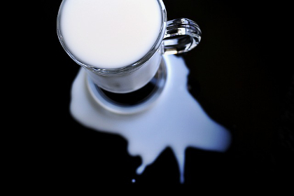 A glass of spilled milk