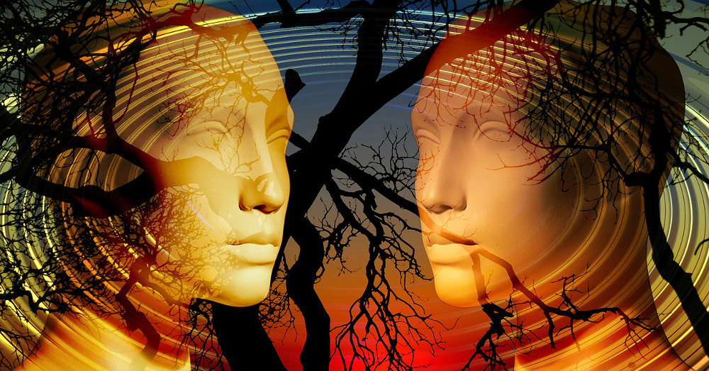 Two generic heads facing each other over silhouettes of trees at sunset
