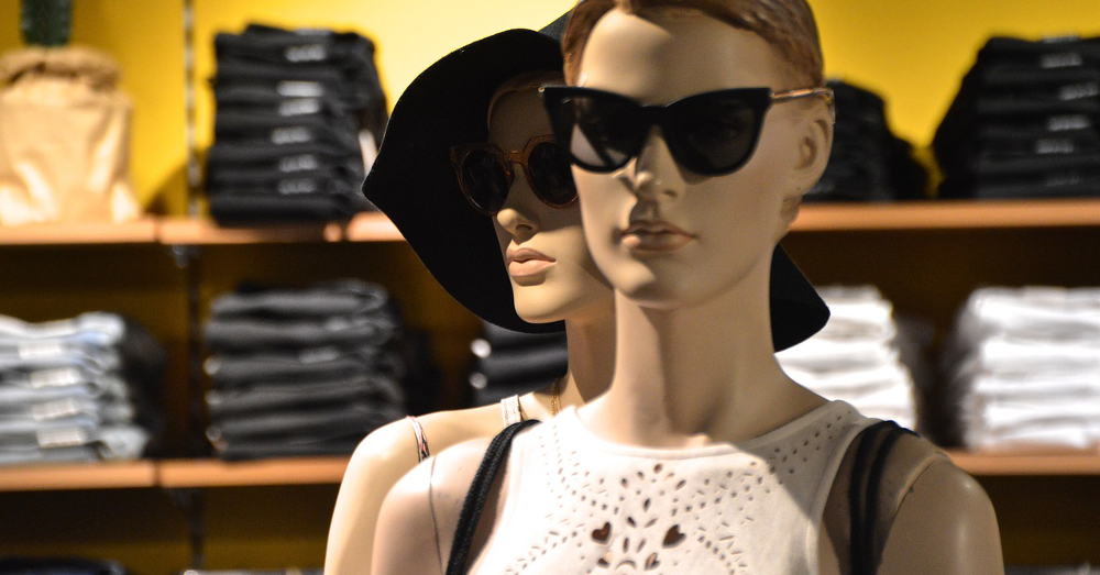 Mannequins dressed in high fashion at a clothing store