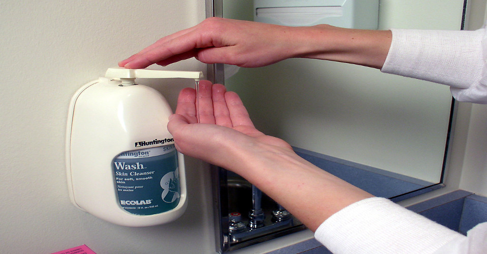 hand sanitizer being applyed to a hand