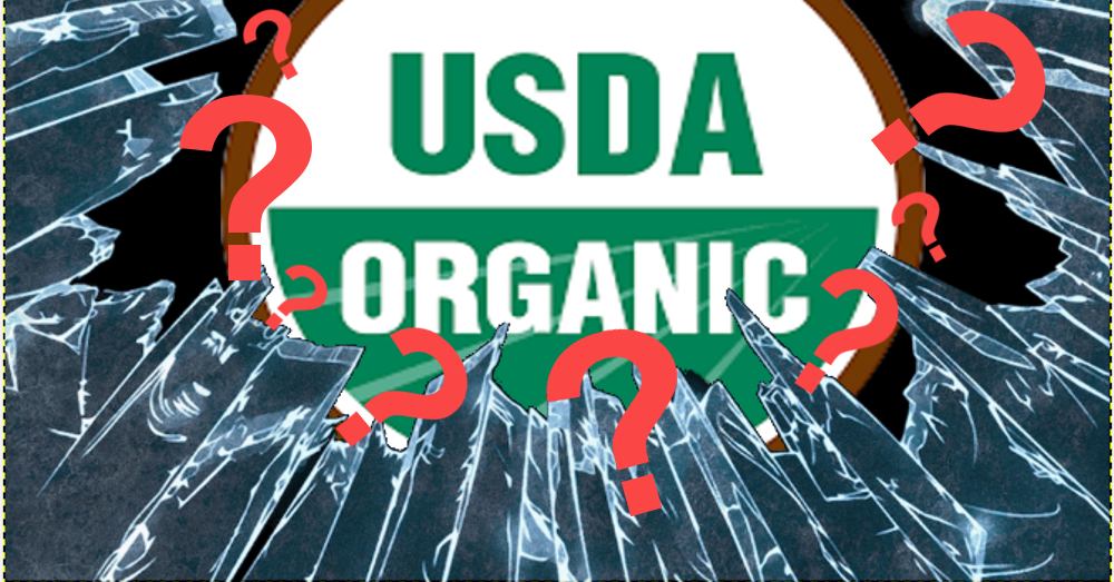 USDA organic seal under broken glass with red question marks
