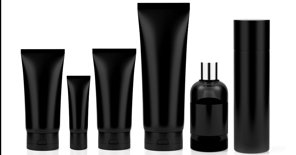row of black personal care tubes and bottles