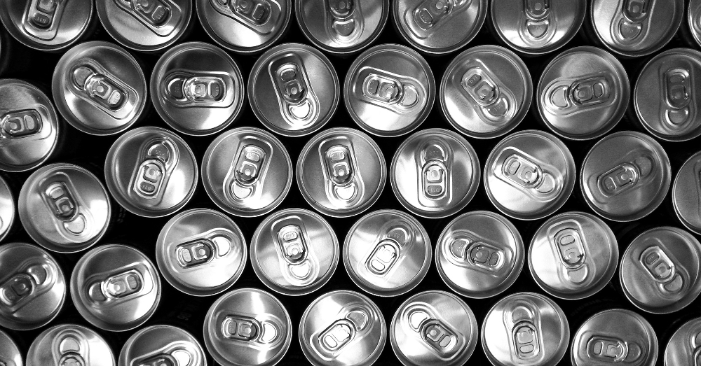overhead view of several soda pop can lids