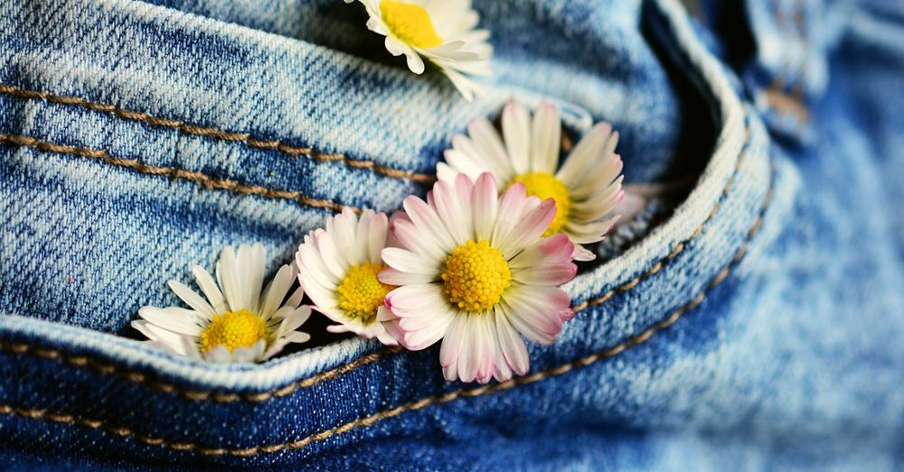 Jeans with flowers in the back pocket