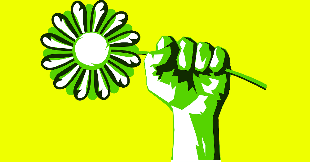 hand holding a green flower in a fist