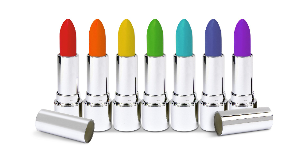 lipsticks in metal cases with the colors of the rainbow in a line