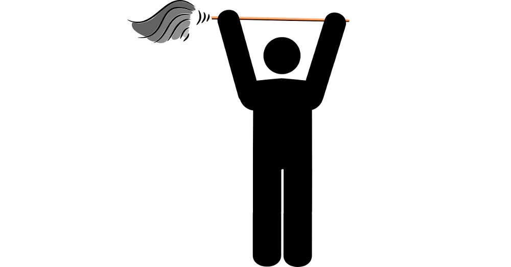 man cleaning with a mop