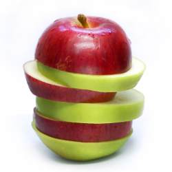 combination of a red and green apple sliced together