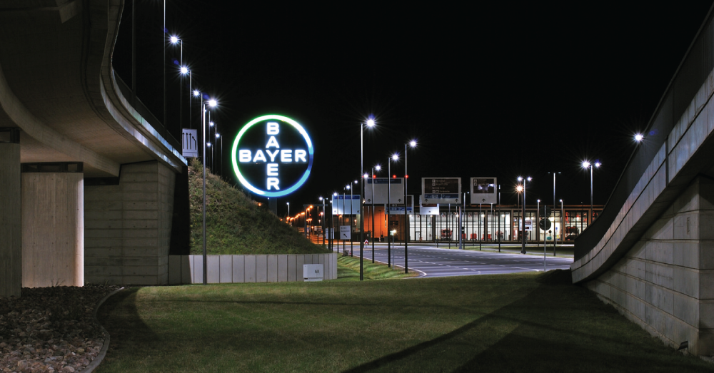 Bayer sign at night.