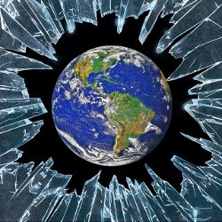 planet earth surrounded by shards of broken glass