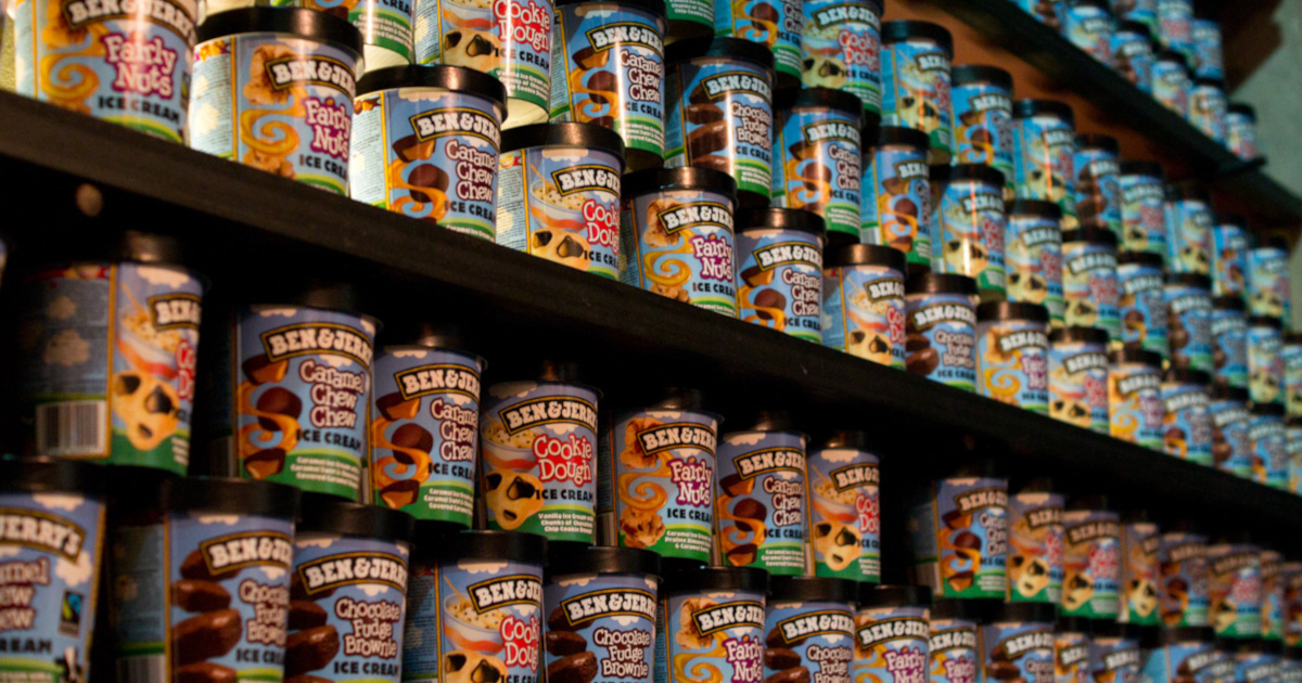 shelves in a grocery store of Ben and Jerrys ice cream pints