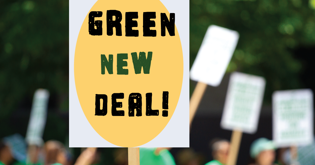 yellow and green sign being held during a march that supports the GREEN NEW DEAL