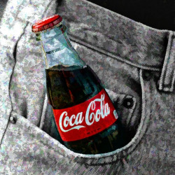 glass bottle of Coca Cola in a front denim pocket