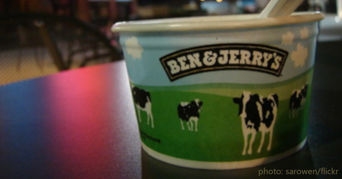 Ben and Jerrys ice cream cup on a table at night