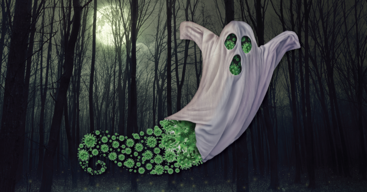 Picture of a ghost over the top of green viruses with a background of a scary, dark forest