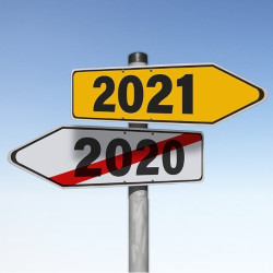 road signs showing 2020 is over and 2021 is next