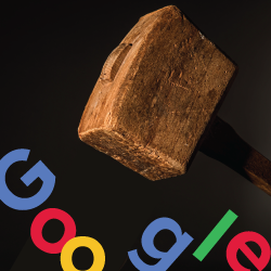 large wooden hammer breaking up the google logo