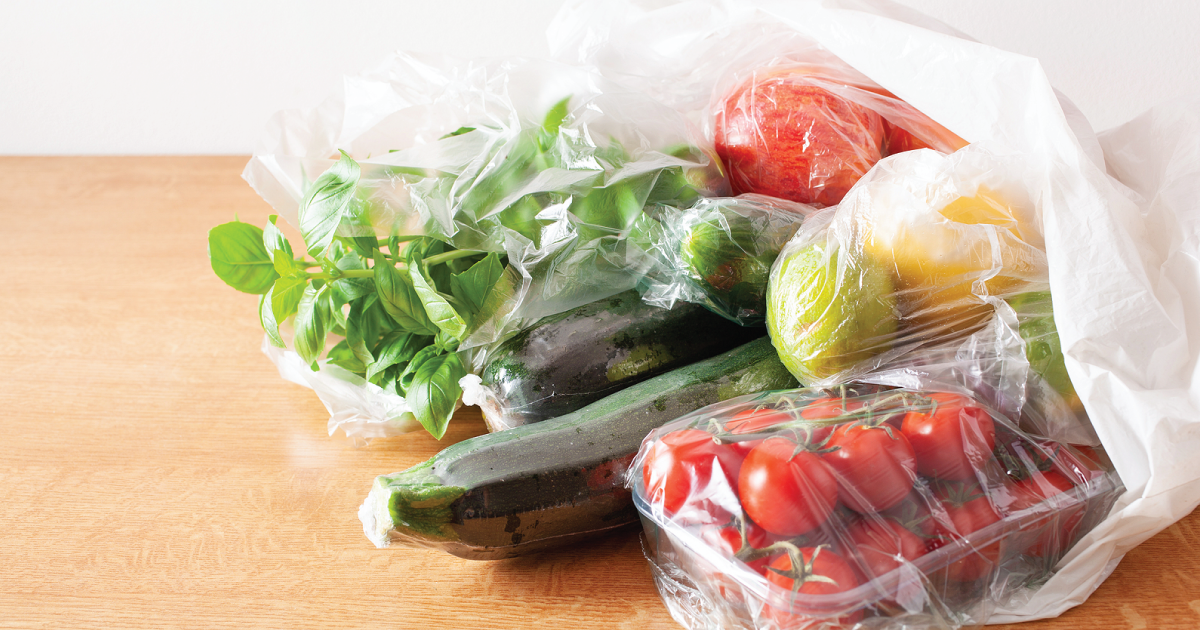 Plastic bags with veggies inside.